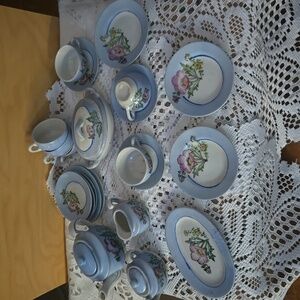 1950's Rare porcelain tea set+ service for six. One dessert plate missing.